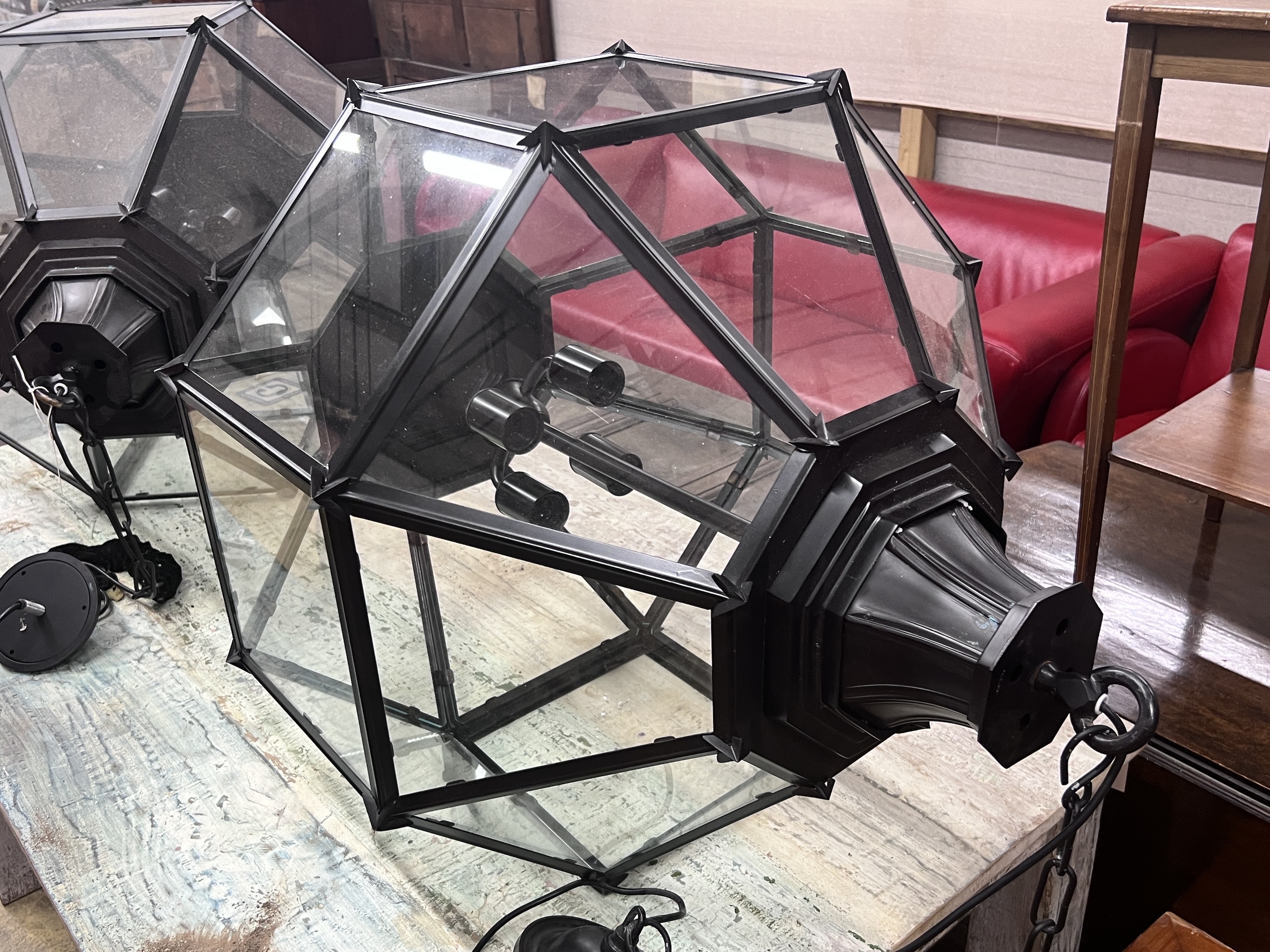 A pair of contemporary octagonal glazed metal hall lanterns, height 96cm